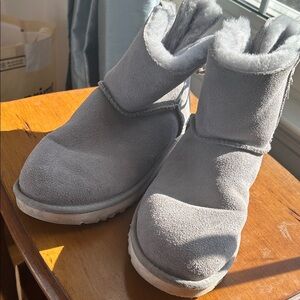 Grey UGG boots leather ties in faux fur lined in good condition
